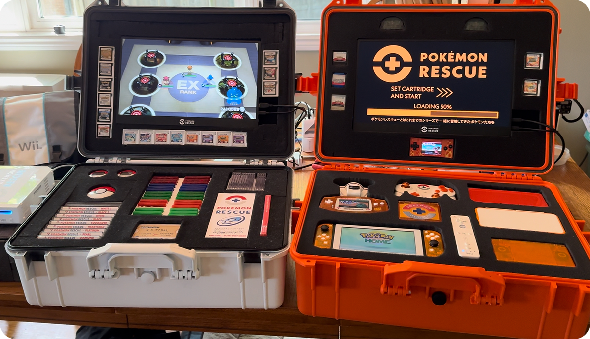 Two boxes full of hardware and software relating to the Pokémon Rescue project.
